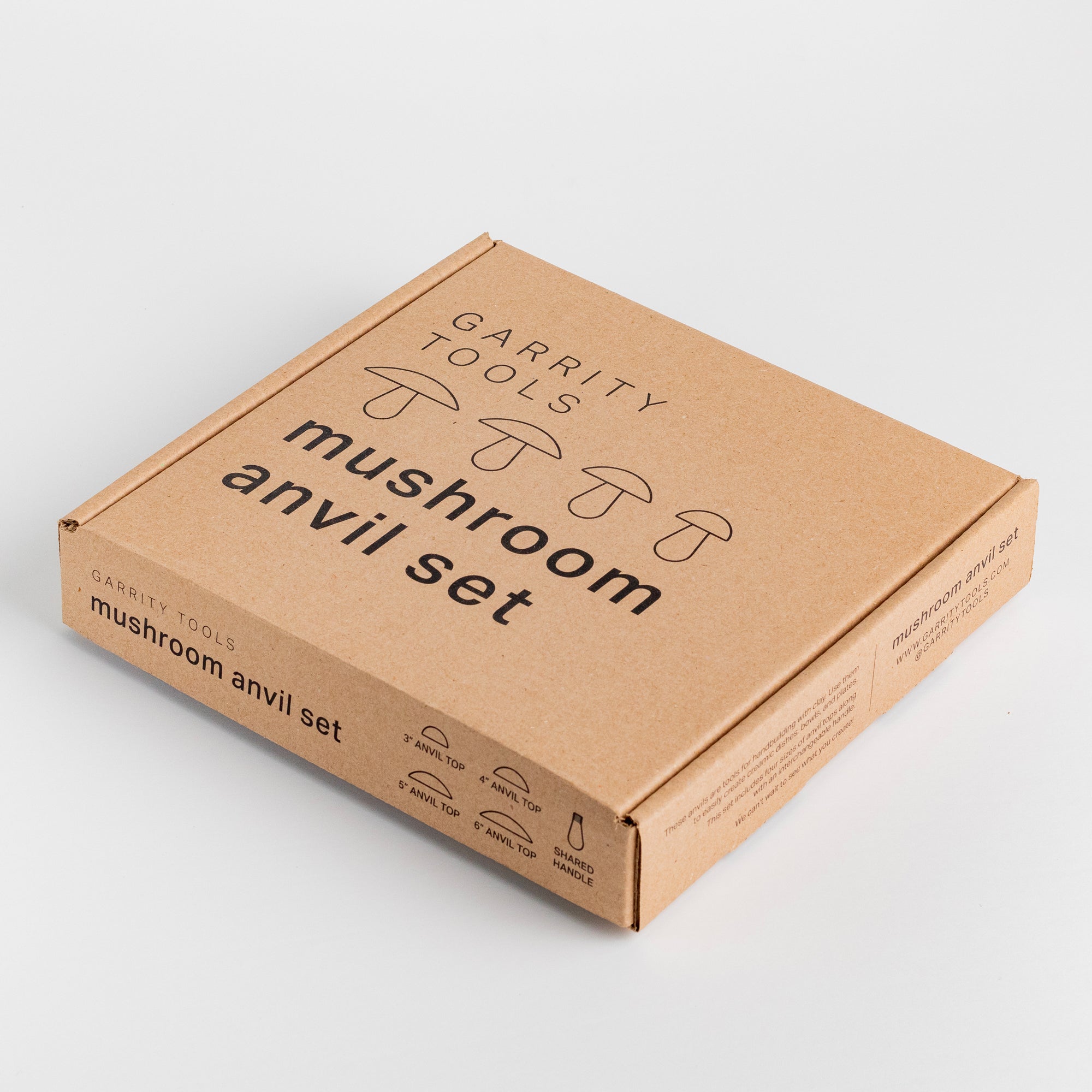 a cardboard box with text that reads Garrity Tools Mushroom Anvil Set