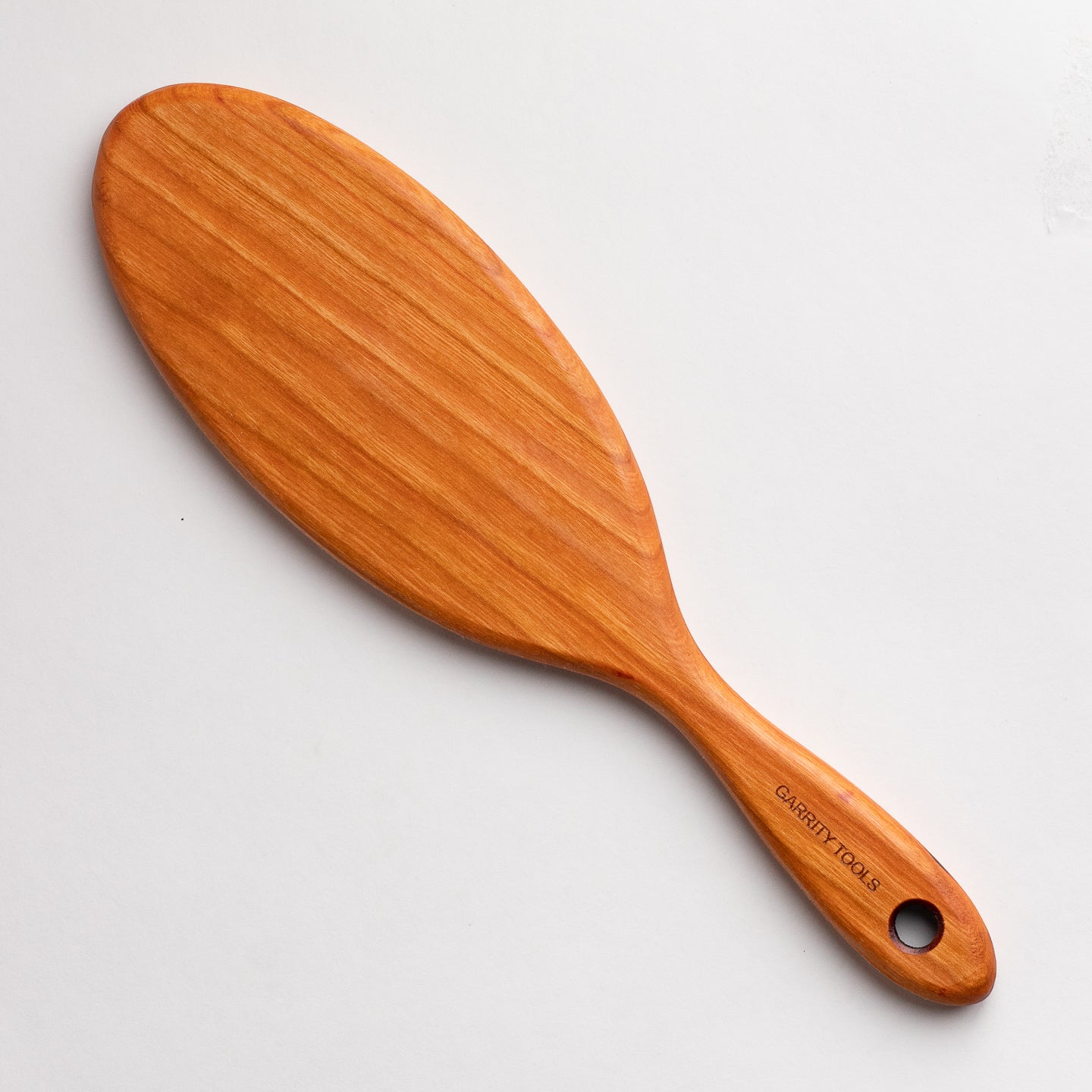 Garrity Tools wooden paddle pottery tool on white background