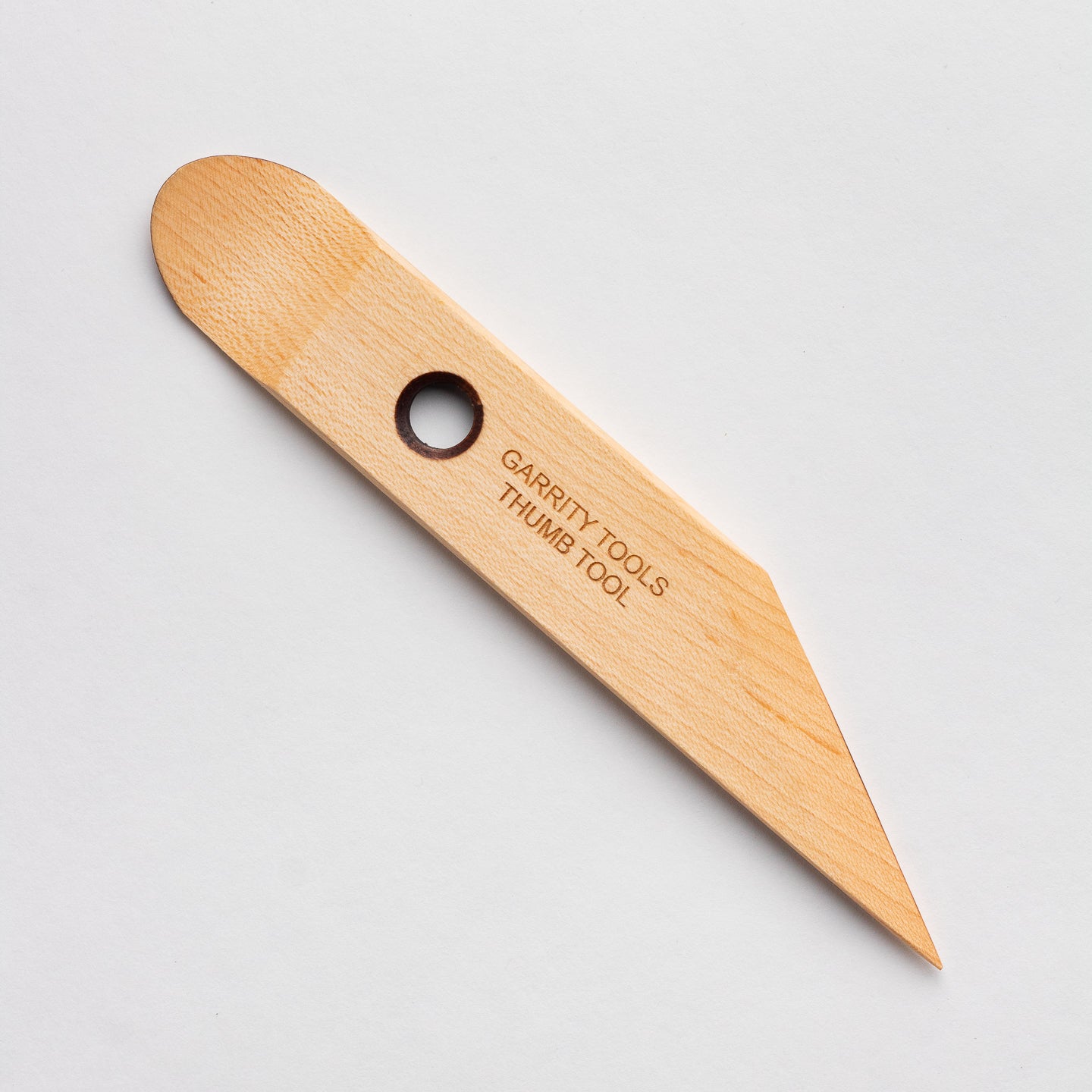 Garrity Tools Thumb wooden pottery tool on white background